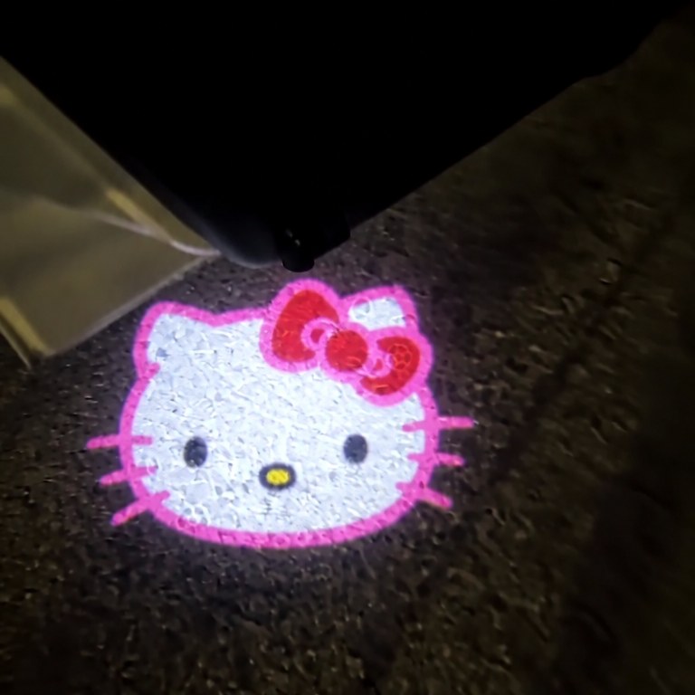 Hello Kitty door projector at night