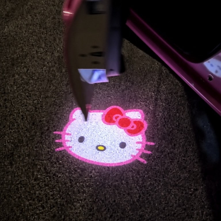 Hello Kitty door projector at night