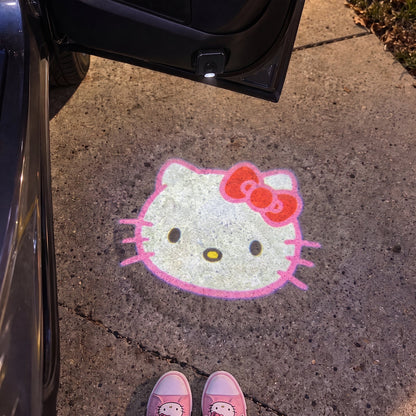 Hello Kitty car door projector at night